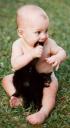 Baby biting catâ€™s tail!
